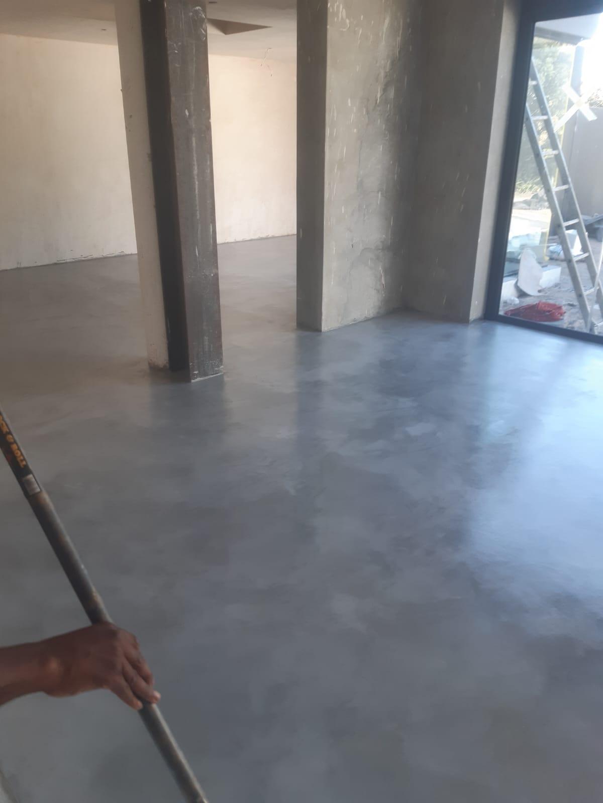 Skimmed floor surface levelled ready for its final finish